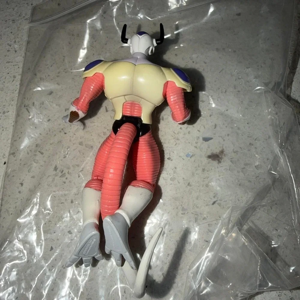 Dragon Ball Z Frieza action figure with pink, beige, and white color scheme